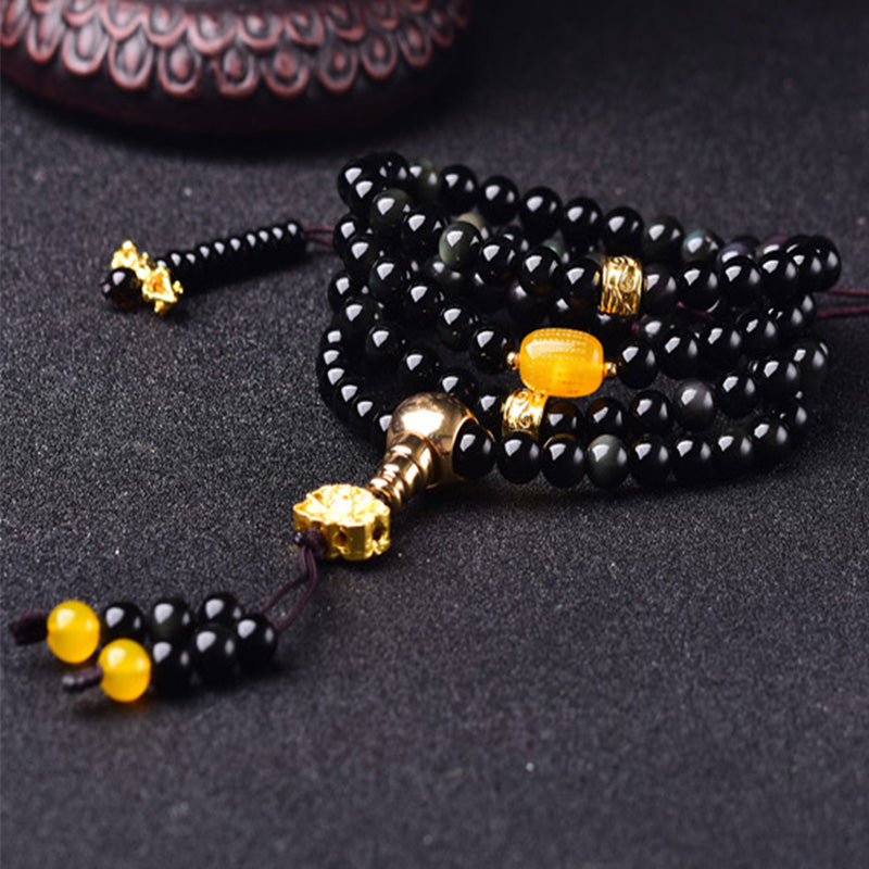Armband Schwarzer Obsidian mit goldenem Lotus und Citrin Anhänger