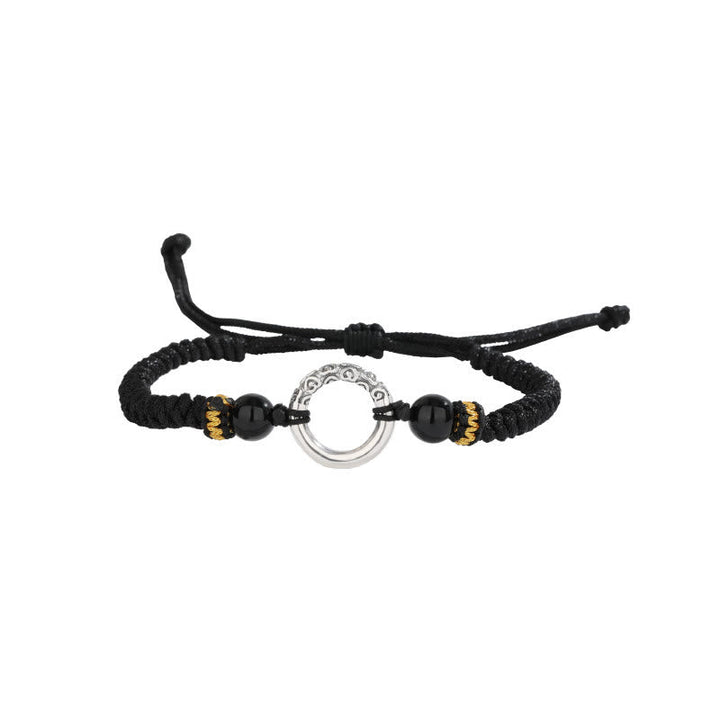 Schwarzes Armband 925 Silber mit Obsidian und goldenem Zierrat elegant.