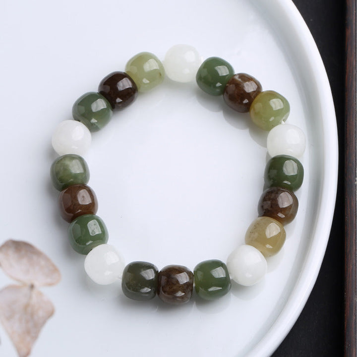 Jade Armband Glück Segen Naturstein grün weiß braun Perlen Flachaufnahme
