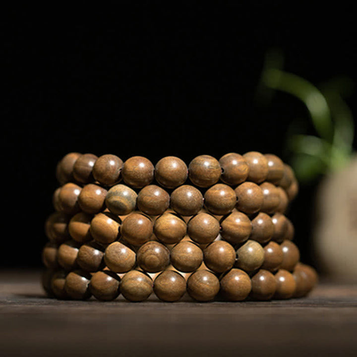 Armband Sandelholz – Frieden braune Kugeln elastisch Naturstein elegant