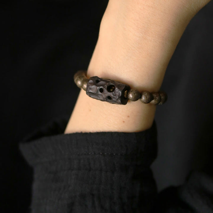 Armband Kupfer Ebenholz Frieden Balance Energie am Handgelenk getragen