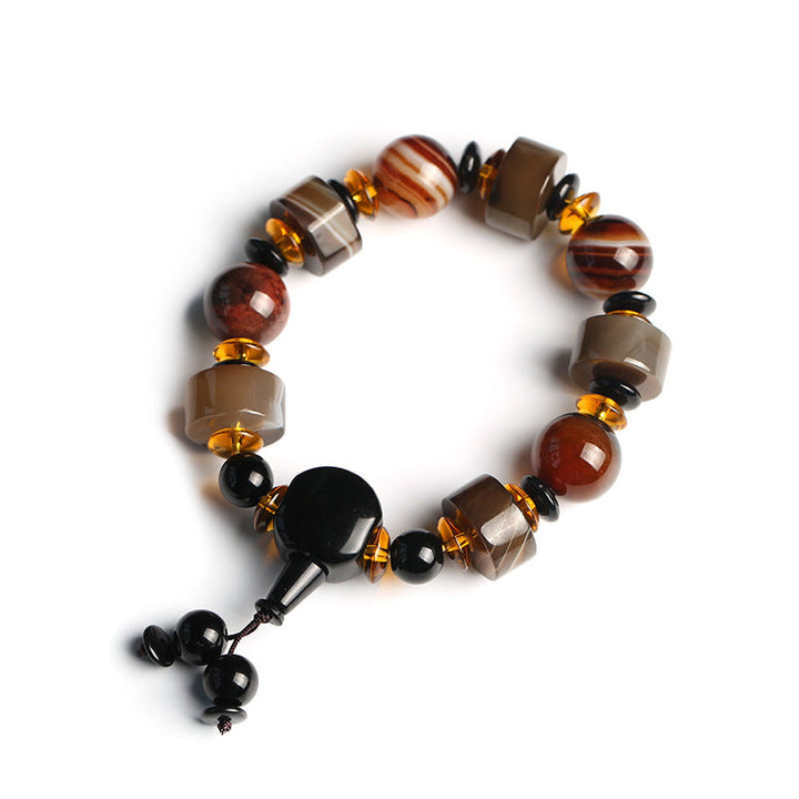 Armband Onyx – Glück Balance mit braunen Steinen und goldenen Perlen