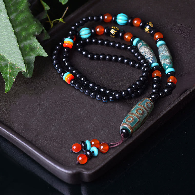 Anhänger Dzi Neun-Auge Tibet Obsidian Gebetskette Schutz