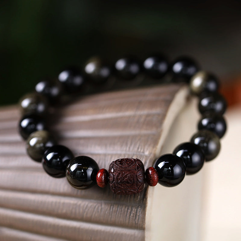 Schwarzes Obsidian Armband mit Om Mani Padme Hum Anhänger Naturstein