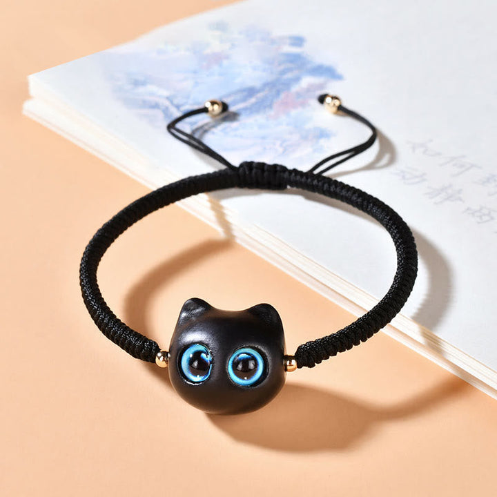 Armband Ebenholz Katze mit blauen Augen schwarzes elastisches Armband