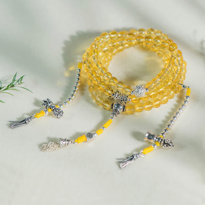 Gelbe Citrin Mala Perlenarmband mit silbernen Verzierungen Quaste.