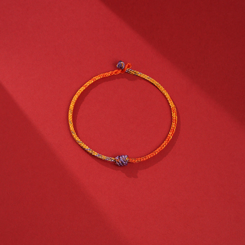 Armband Bunt Lila Gold Rot geflochten elastisch Perlen.