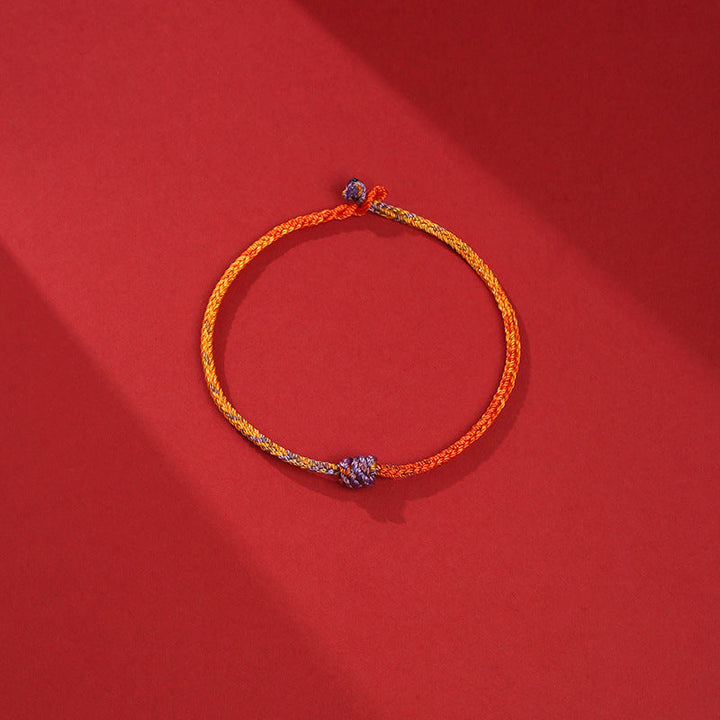 Armband Bunt Lila Gold Rot geflochten elastisch Perlen.