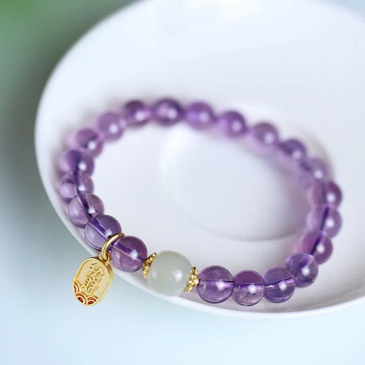 Armband Amethyst Kristall lila Perlen Jade Charm elastisch getragen