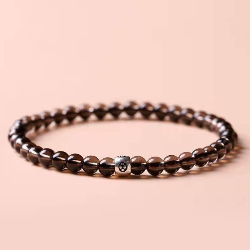 Armband Schwarzer Obsidian Katze – Stärke mit braunen Perlen Flatlay Ansicht