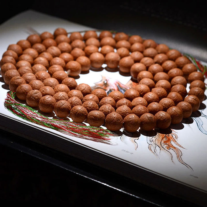 Mala Bodhi Glück Wohlstand Balance Holzperlen Armband Naturstein braun