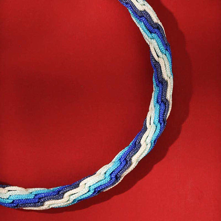 Armband 925 Silber – Segen Stärke blaues Geflecht elastisch getragen