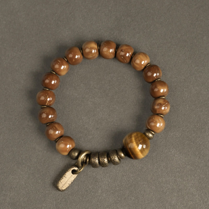Armband Tigerauge Obsidian mit Metallperlen und Anhänger elegant.