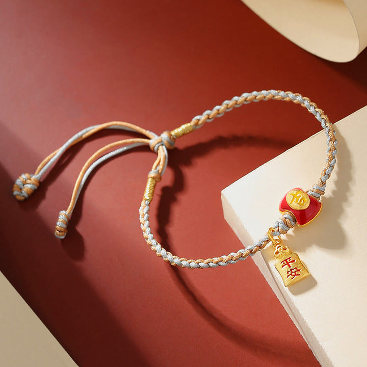 Glücksbringendes Armband 925 Silber mit roten Charms am Handgelenk