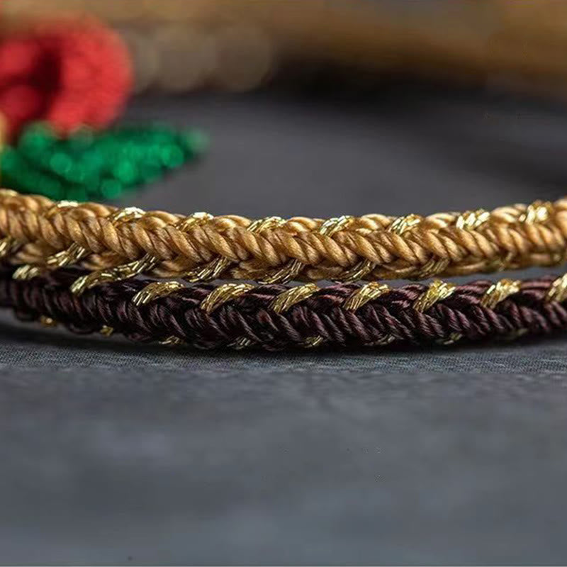 Armband – Glück & Frieden & Energie goldene geflochtene Schnur elegant