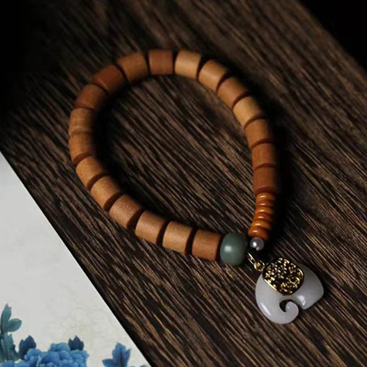 Armband Sandelholz Jade Elefant Schutz elastisch Naturstein Handgelenk getragen