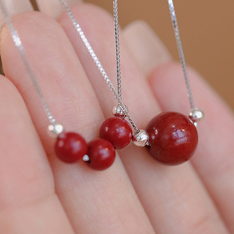 Zinnober Anhänger Sterlingsilber Kette rote Perlen
