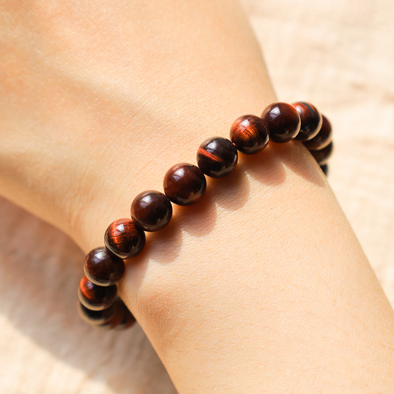 Armband Tigerauge – Heilung & Energie, braune Perlen Handgelenk getragen