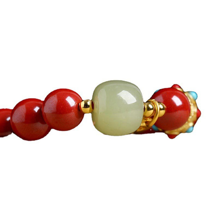 Armband Grüner Aventurin Zinnober Schutz Glück Nahaufnahme Perlen Gold