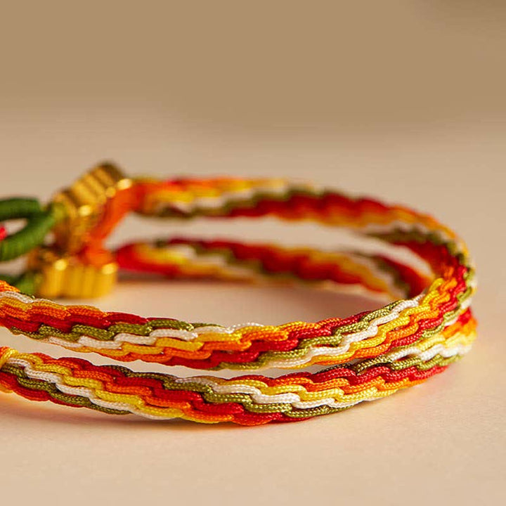 Armband Roter Achat mit goldenen Fäden elastisch geflochten Stärke
