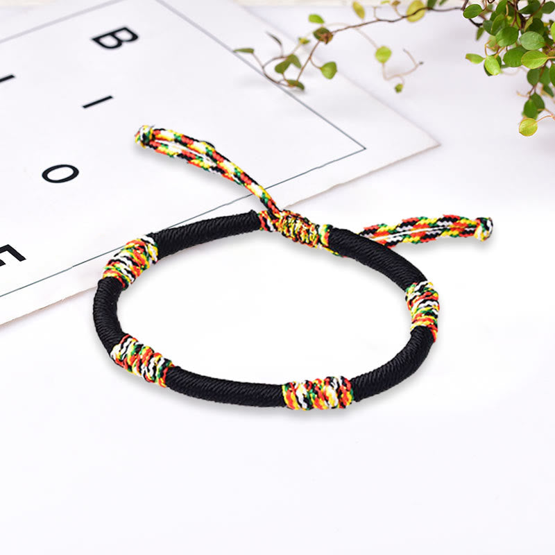 Armband – Schutz & Glück Balance mit bunten Wicklungen schwarze Schnur