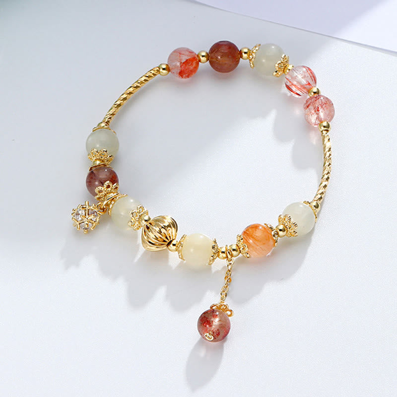 Armband Bunt Rutilquarz Katzenauge goldene Perlen Naturstein elegantes Design.