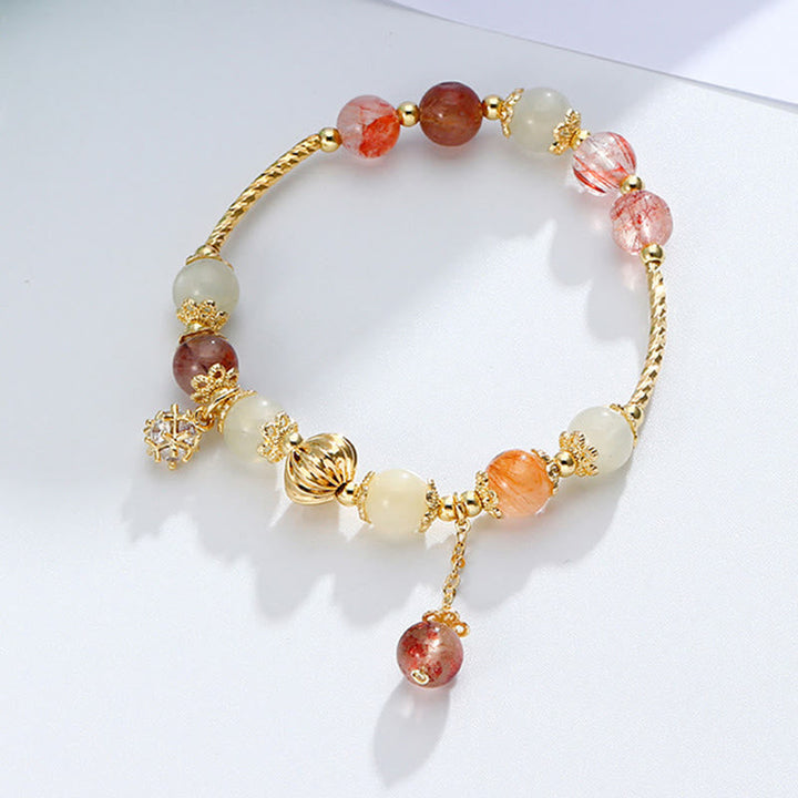 Armband Bunt Rutilquarz Katzenauge goldene Perlen Naturstein elegantes Design.