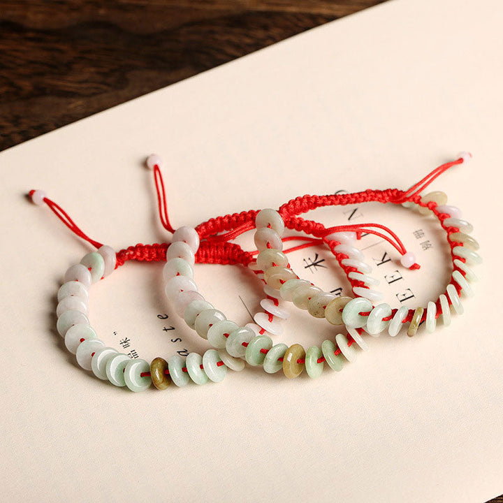 Armband Jade mit roten Schnüren und weißen Perlen Schutz Glück