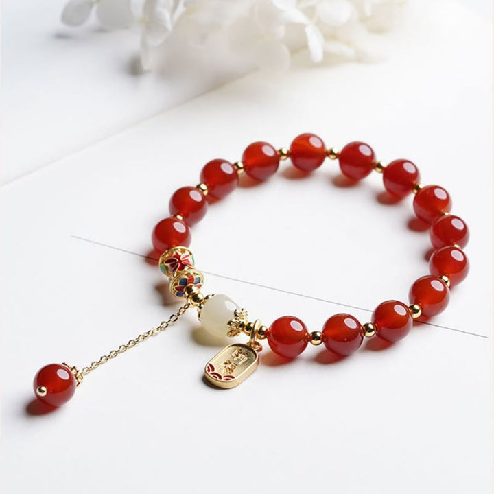 Armband Roter Achat mit Jade und Fu-Zeichen Charm elegant.