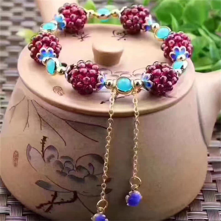 Armband Granat Garnet Ruhe mit roten Steinen Türkis Perlen elegant.