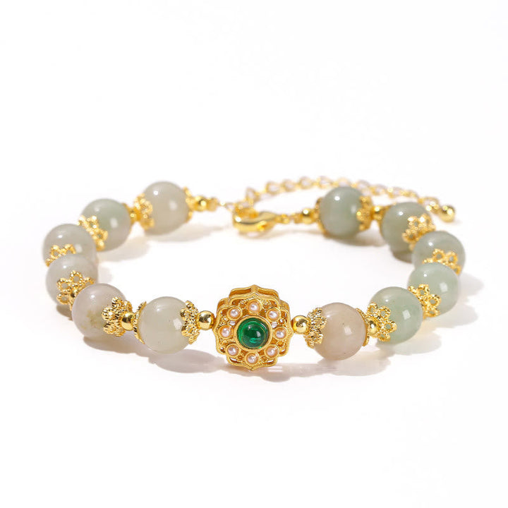 Armband Jade Wohlstand Harmonie mit goldfarbenen Perlen elegantes Design.
