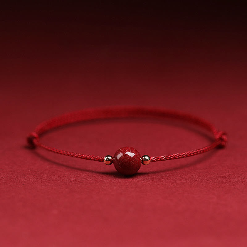 Armband Zinnober – Glück & Segen rotes Naturstein elegantes Schmuckstück Flat Lay