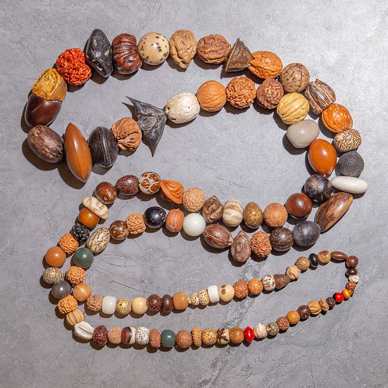 Mala Bodhi Glück Wohlstand Perlenarmband Natursteine Holz braun.