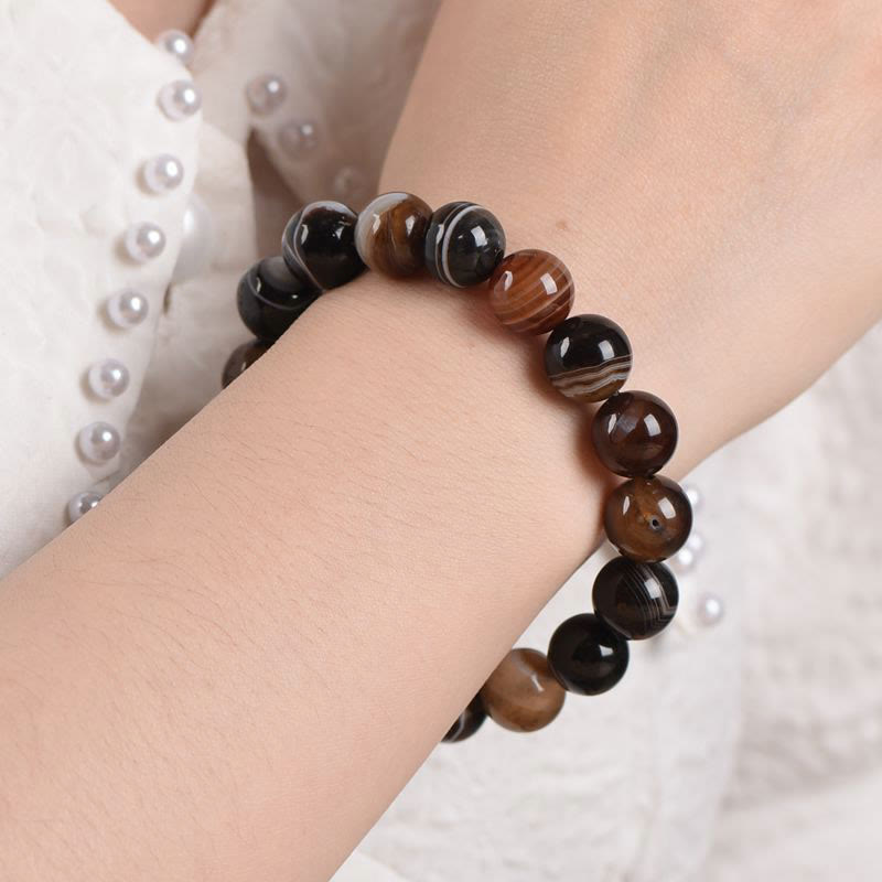Armband Onyx – Glück Energie braun schwarz Naturstein Perlen Handgelenk