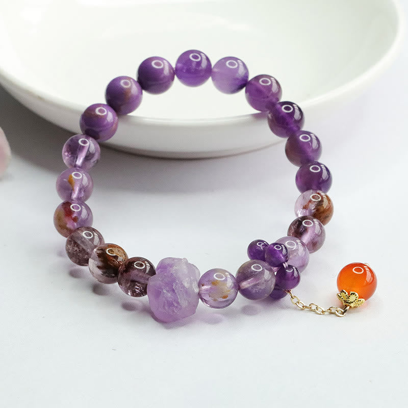 Armband Amethyst Lila Phantom Edelstein elastisch mit orange Anhänger