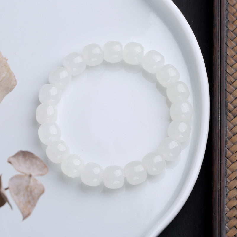 Jade Armband Glück Segen weiße Perlen Flachaufnahme Naturstein elastisch