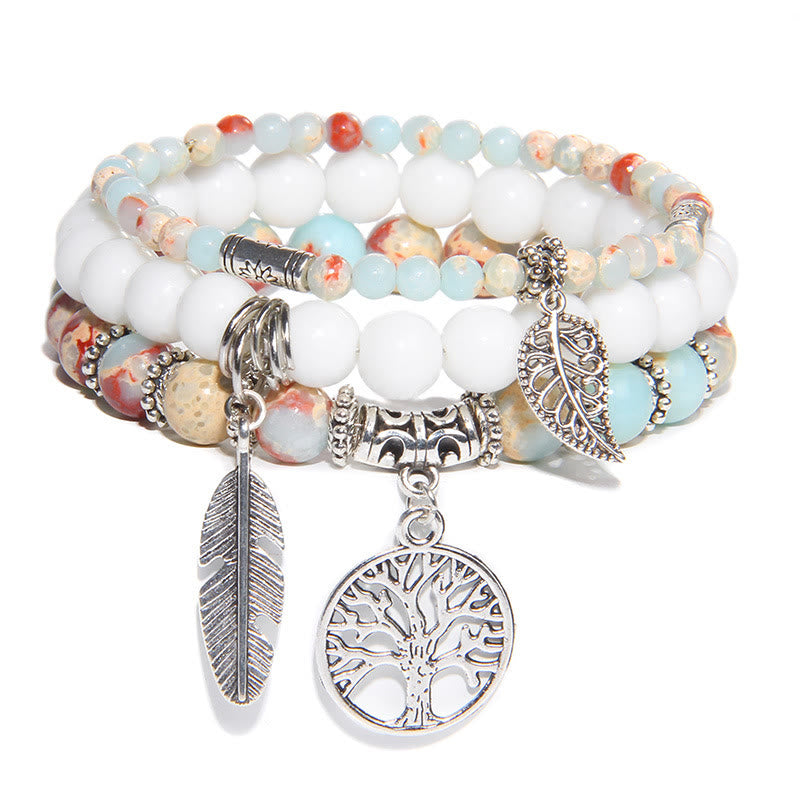 Armband Türkis Lebensbaum Balance weiße Perlen silberne Charms elastisch