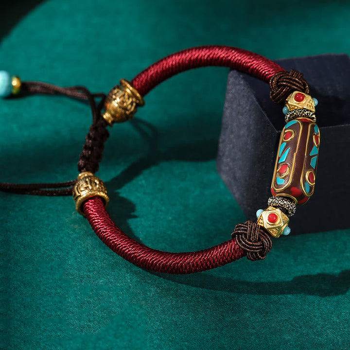 Rotes Armband mit goldenen Om Mani Padme Hum Perlen Türkis