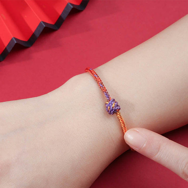 Armband Bunt Lila Gold Rot elastisch am Handgelenk getragen