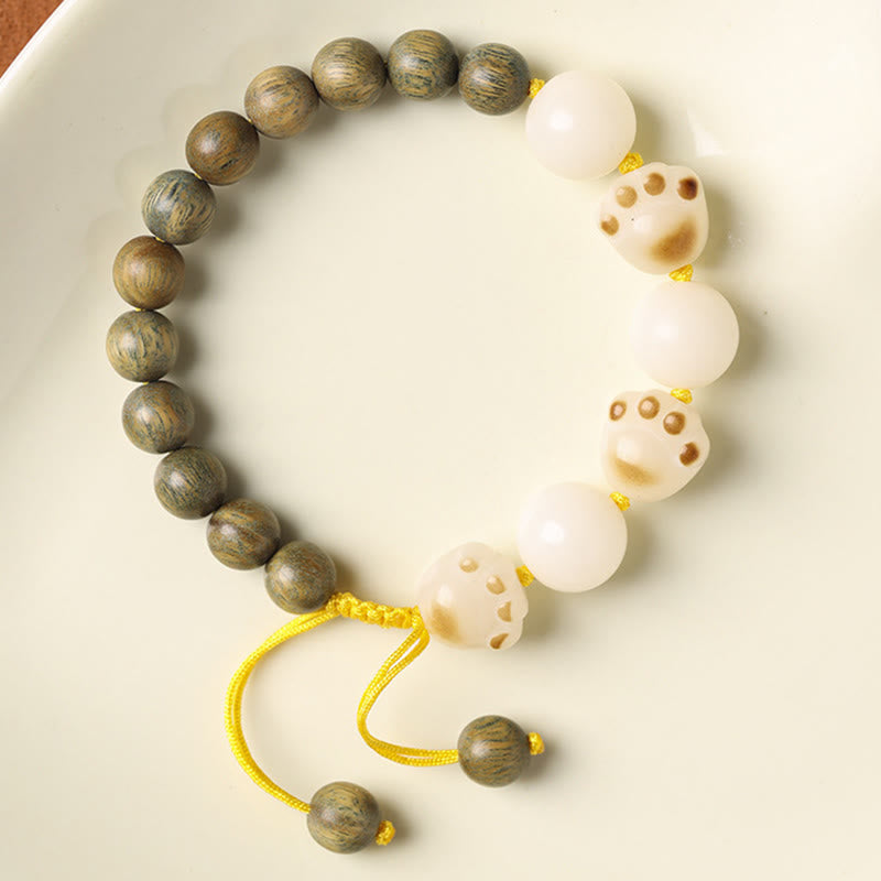 Armband Sandelholz Bodhi Katze mit weißen Perlen elastisch.