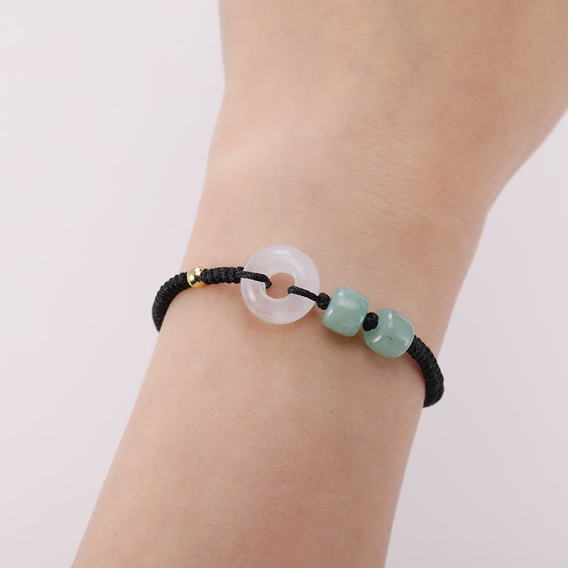 Armband Grüner Aventurin Weiße Jade Paar am Handgelenk getragen schwarze Kordel