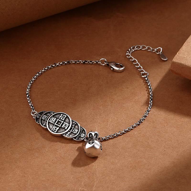 Silberarmband mit chinesischen Münzen und Glöckchen Anhänger elegant.