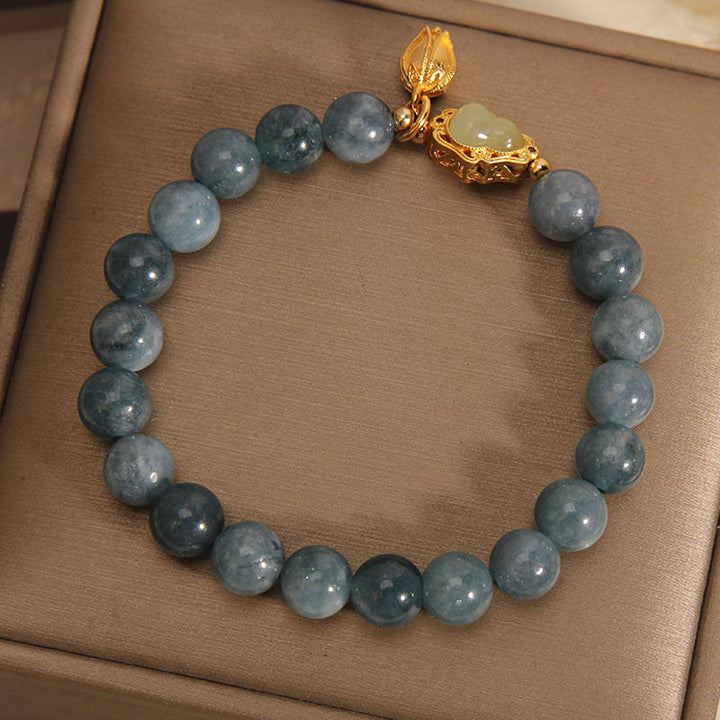 Jade Armband mit goldener Kürbis-Anhänger, graugrüne Perlen, Glück.