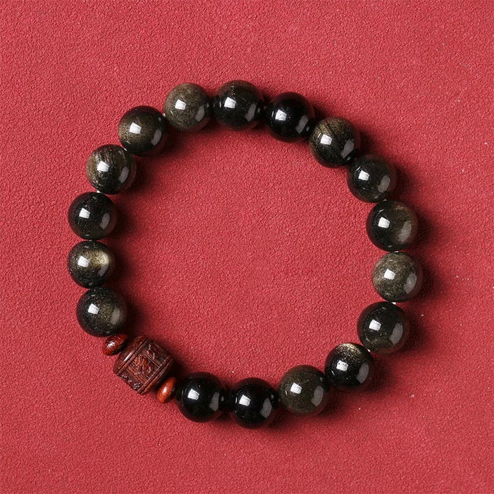 Schwarzes Obsidian Armband mit Om Mani Padme Hum Anhänger elegant