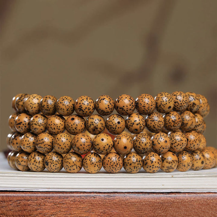 Mala 108 Perlen Bodhi Samen Armband Naturholz braun gepunktet