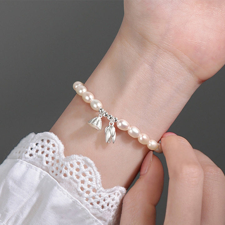 Armband 925 Silber Perle Lotus Heilung elegantes Perlenarmband Handgelenk getragen