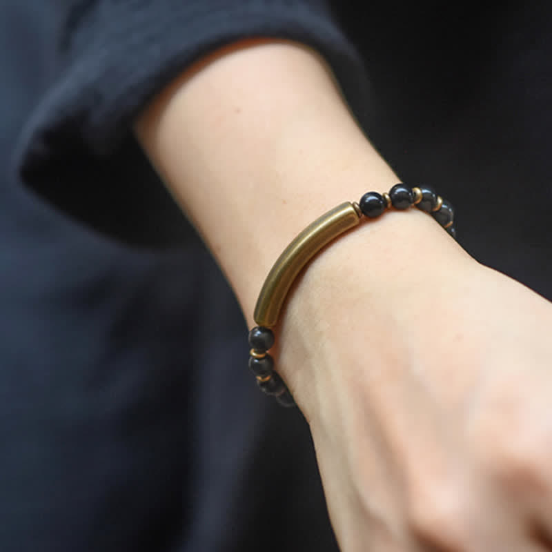 Armband Schwarzer Obsidian Kristall Paar am Handgelenk getragen elegant