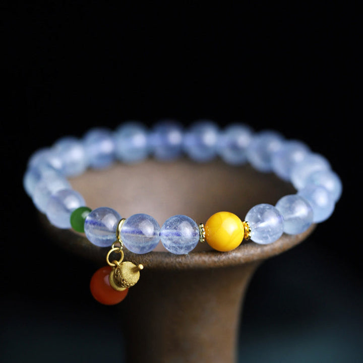 Armband Aquamarin Roter Achat – Frieden elegantes Perlenarmband getragen