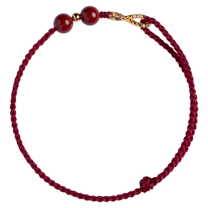 Armband Rotes Band Gold Infinity Symbol