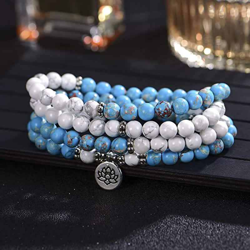 Armband Türkis Lotus – Segen mit weißen und blauen Perlen Lotus Anhänger